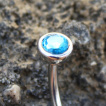 Piercing nombril style victorien  losange bleu surmont de strass clair